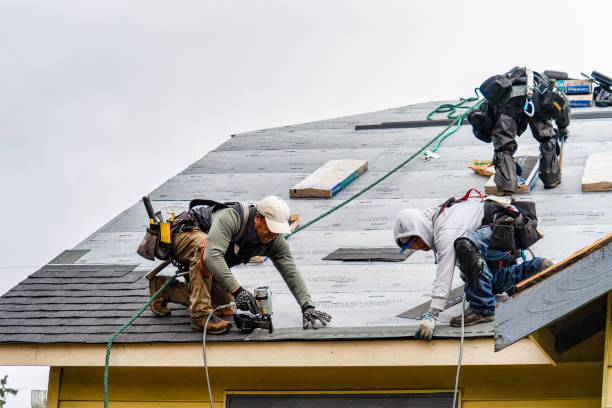 Professional Gutter Installation technician working in Seaford, NY